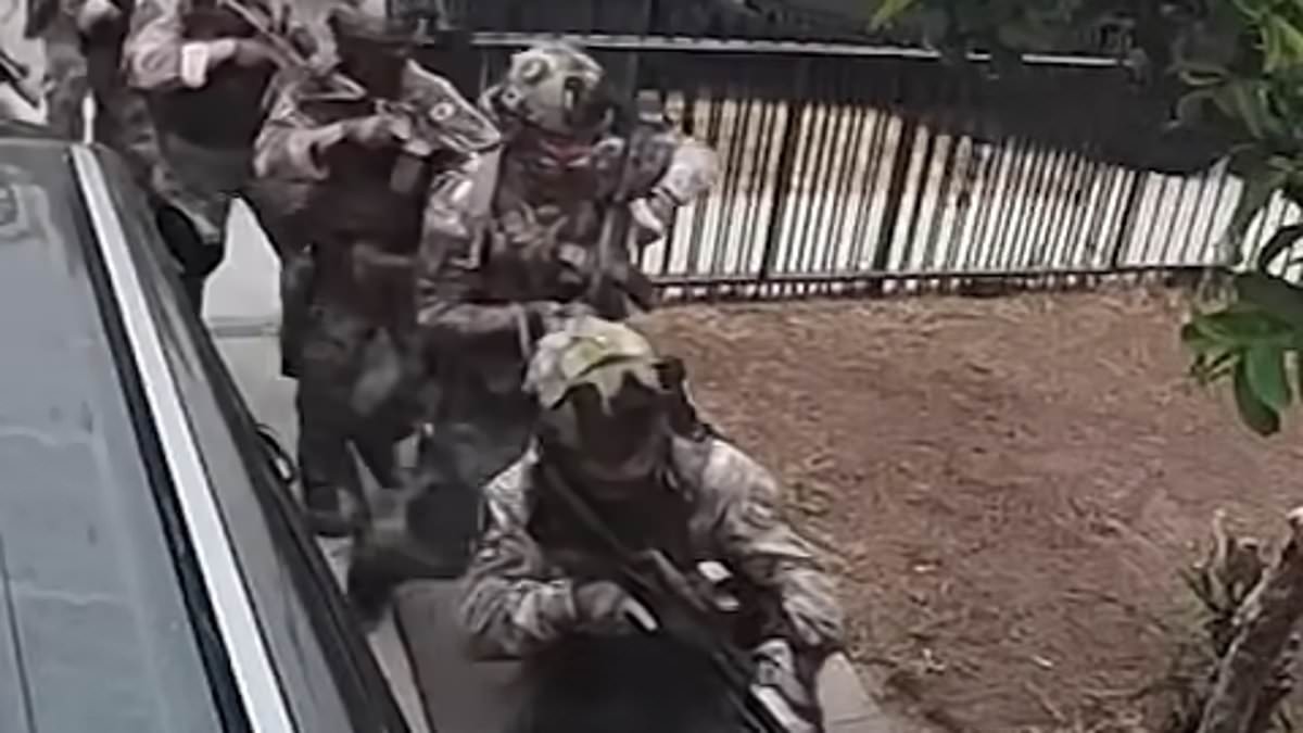 Moment Border Patrol use huge explosion to blast their way into house with woman and two children