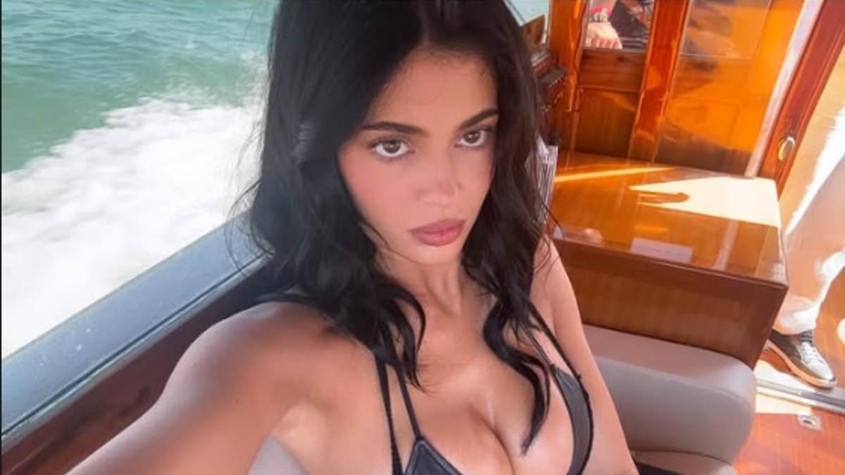 Kylie Jenner sizzles in busty black bikini the morning after Bezos-Sanchez wedding as her sisters ditch Venice