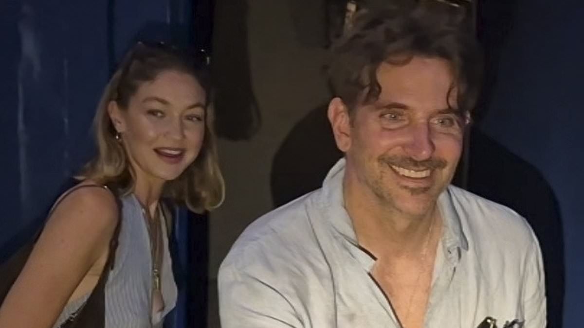 Happy couple Bradley Cooper and Gigi Hadid are greeted by fans following their romantic date night in Paris