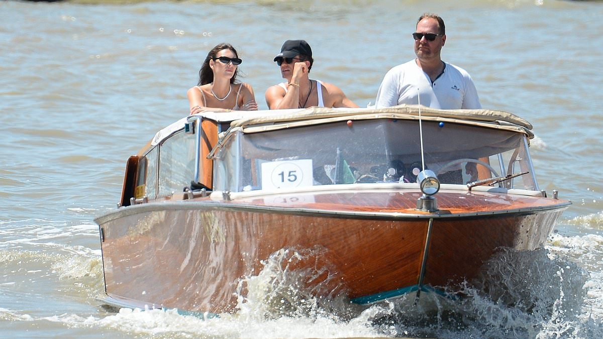 Orlando Bloom has cozy chat with Leonardo DiCaprio's girlfriend at Bezos-Sánchez wedding amid Katy Perry split