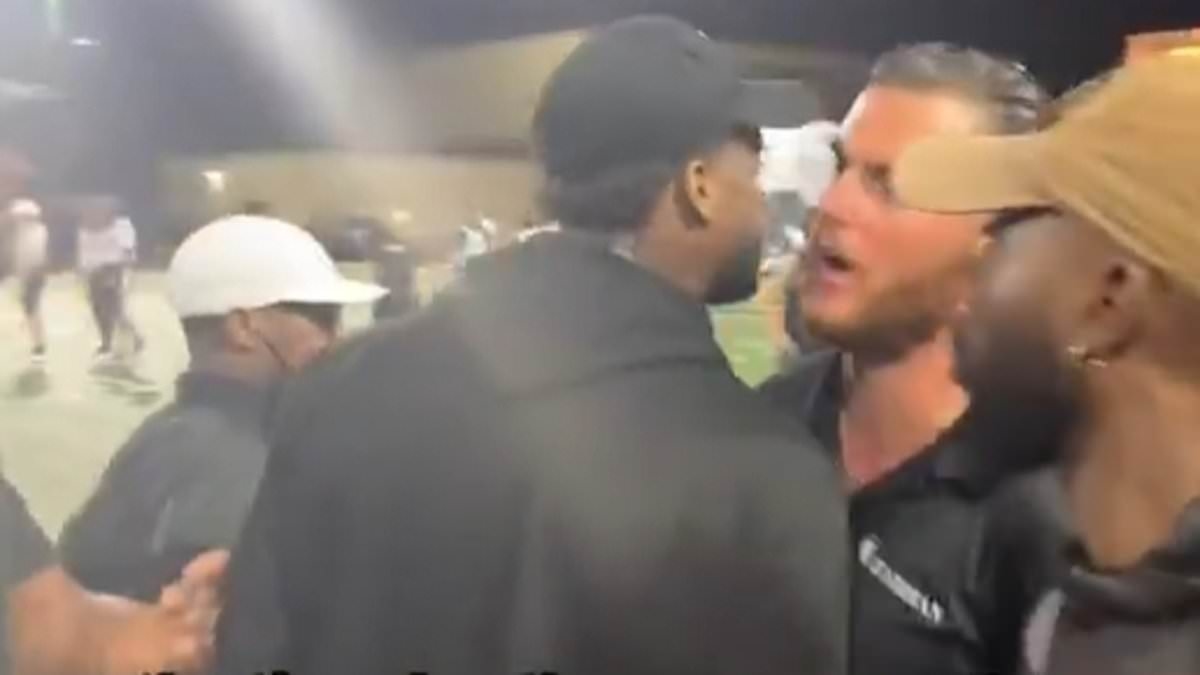 NFL quarterback has to be held back by security after getting into ugly fight while coaching youth football game