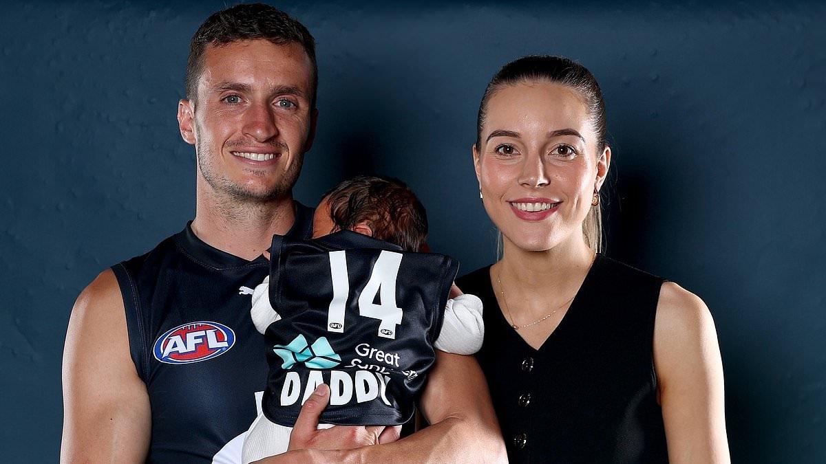 Furious footy WAG names and shames AFL troll who left a horrific one-word slur on photo featuring her baby daughter