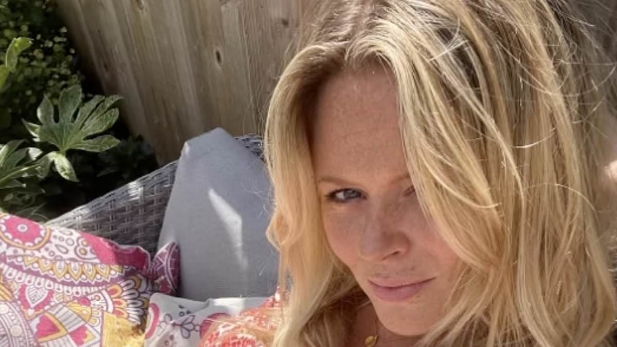 Emily Atack stuns in a bandeau swimsuit to top up her tan after celebrating son's first birthday