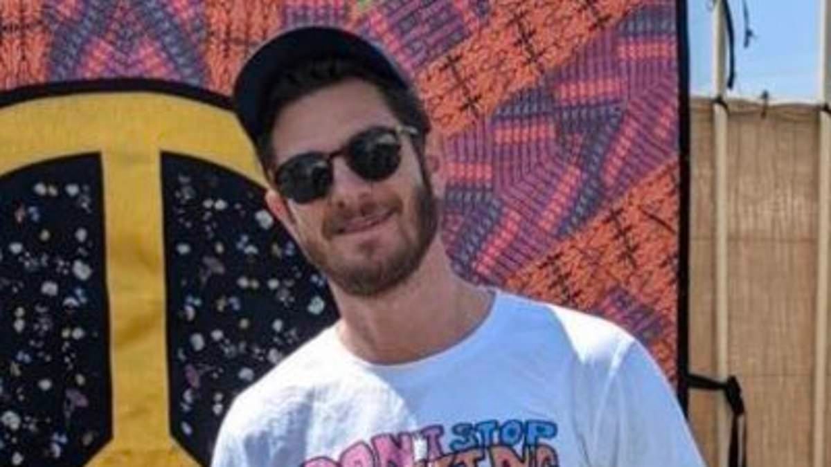 Andrew Garfield 'packs on PDA with American actress Monica Barbaro' at Glastonbury as they're 'spotted holding hands, kissing and cuddling'