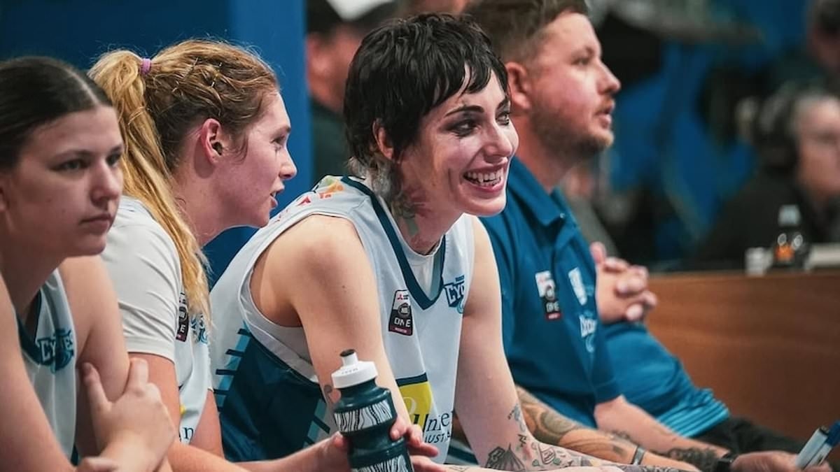 Aussie basketball star goes viral for wearing goth makeup during matches - and turning two of their teeth into FANGS
