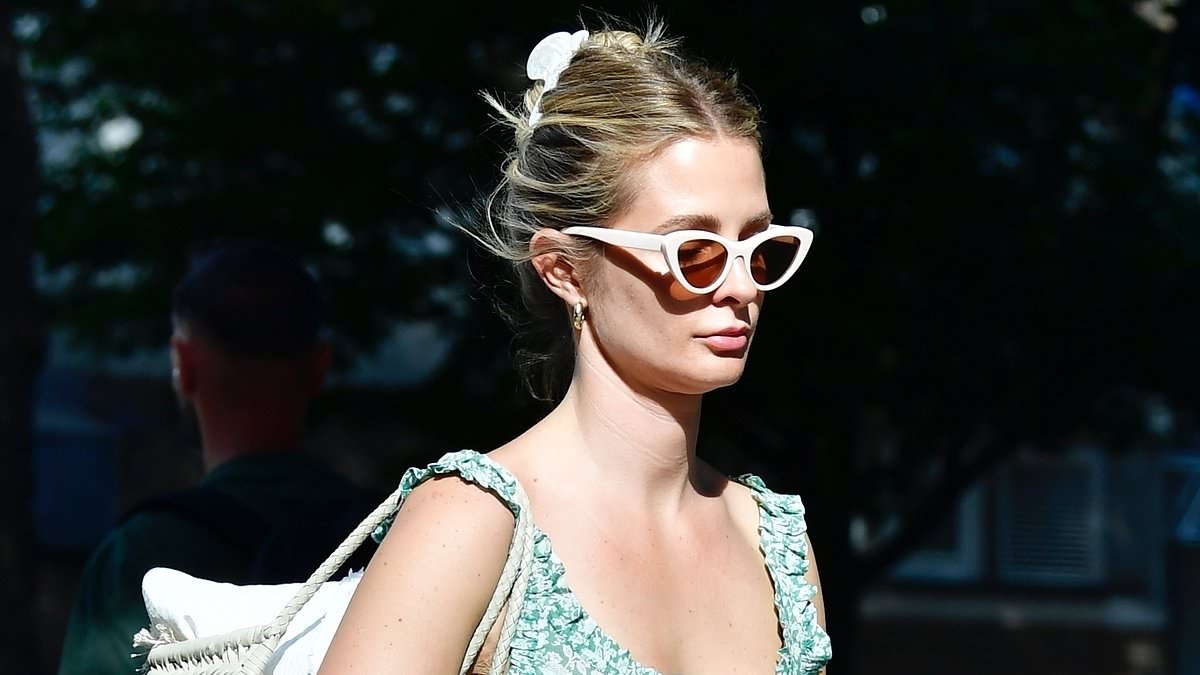 Millie Mackintosh looks effortlessly stylish in a green summer dress as she embraces the London heatwave with temperatures soaring above 30C