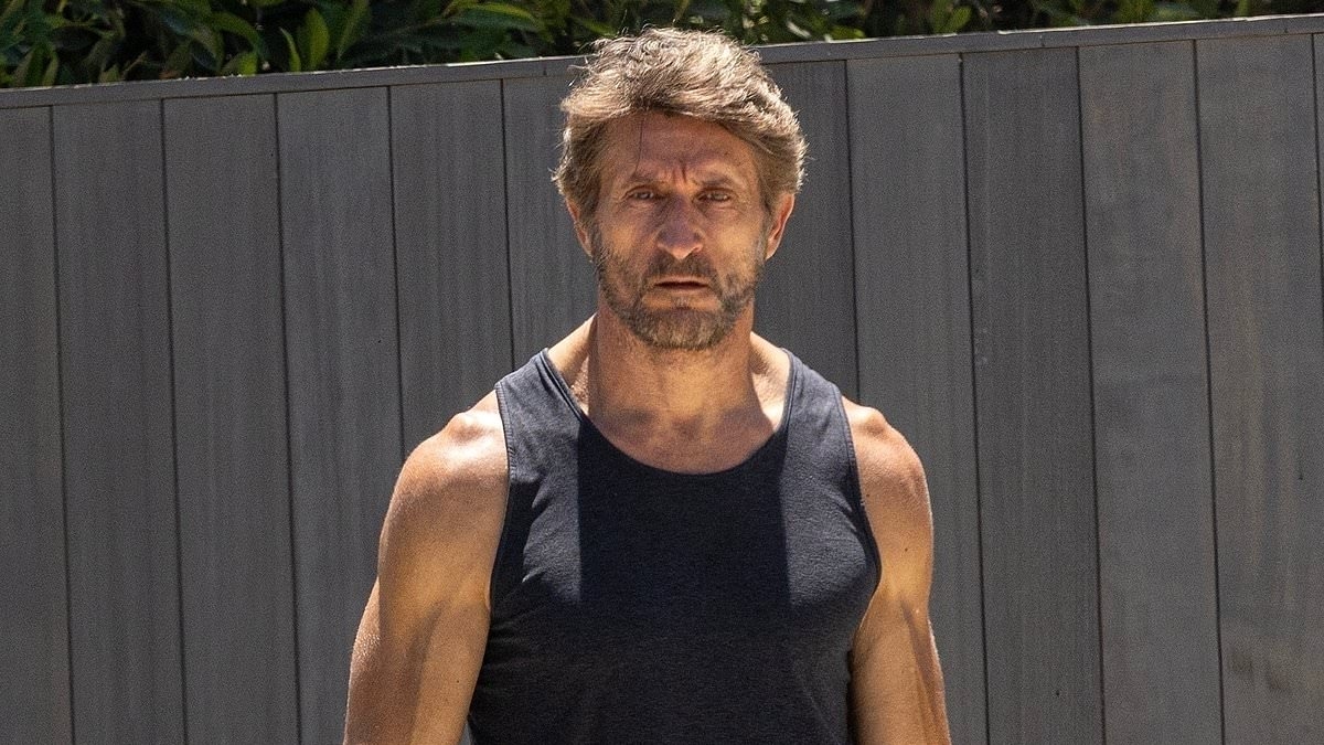 Jonathan LaPaglia looks downcast during a family stroll in Los Angeles as he is seen for the first time since being brutally fired from Australian Survivor via email