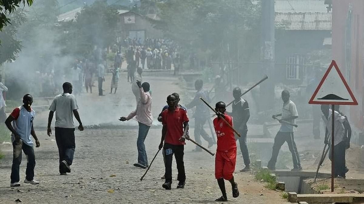 Six people accused of witchcraft are killed by mob who burn two alive, stone others to death or fatally beat them with clubs