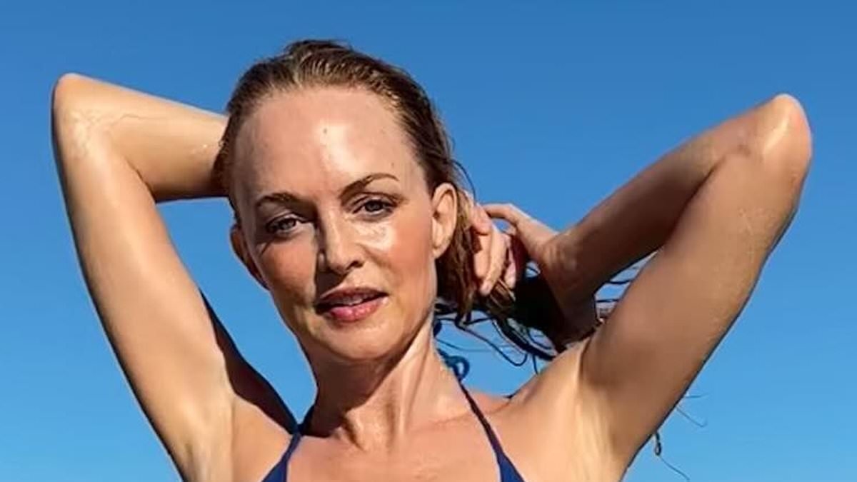Heather Graham, 55, shows off her age-defying physique in a skimpy blue bikini as she shares snaps from her Sardinia trip with Jane Seymour, 77