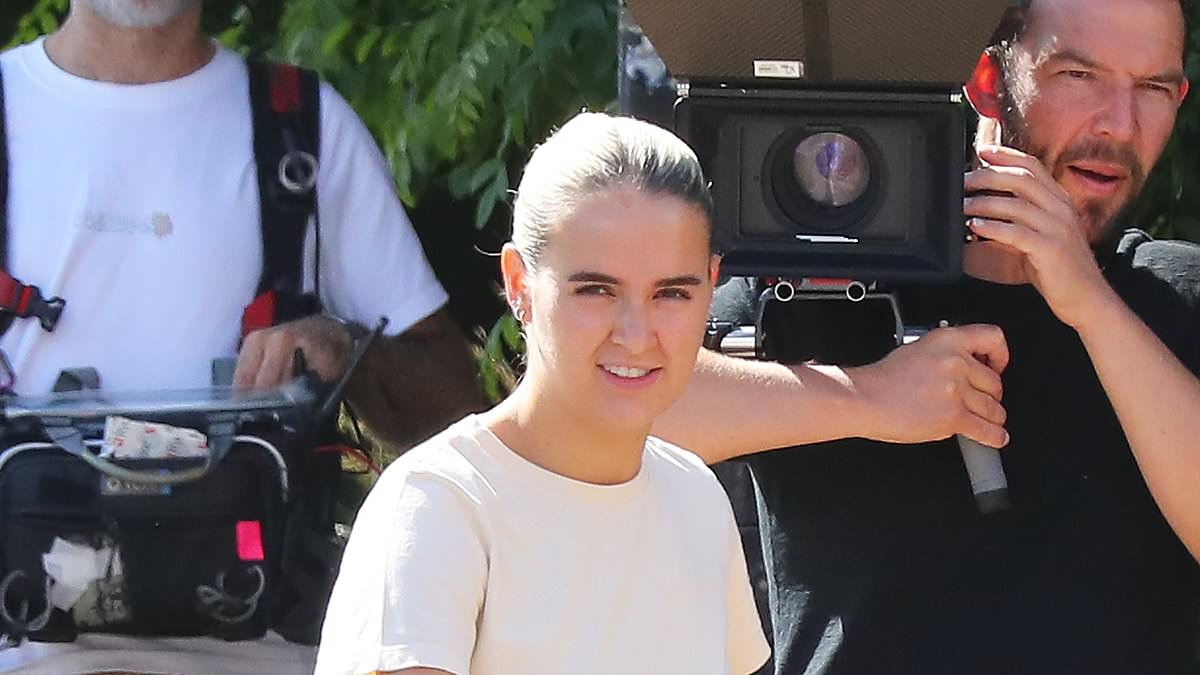 Molly-Mae Hague is surrounded by camera crew while picking up daughter Bambi, 2, from ballet class as she continues filming for second season of her Amazon docuseries
