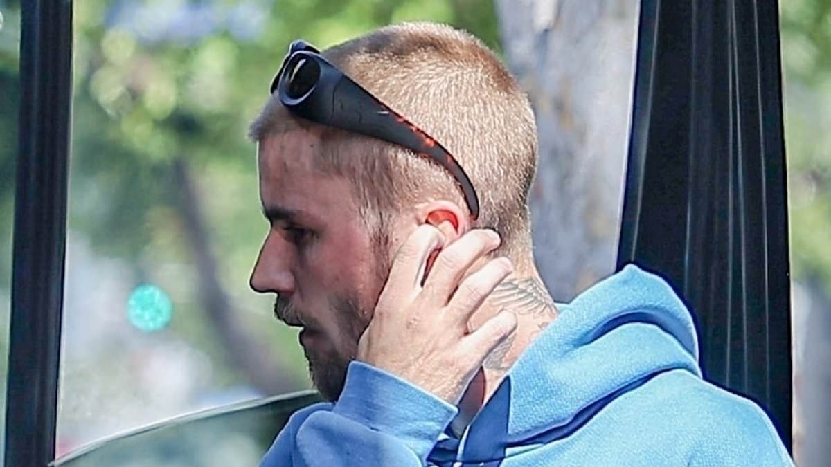Justin Bieber emerges solo from Russian bathhouse as wife Hailey focuses on business