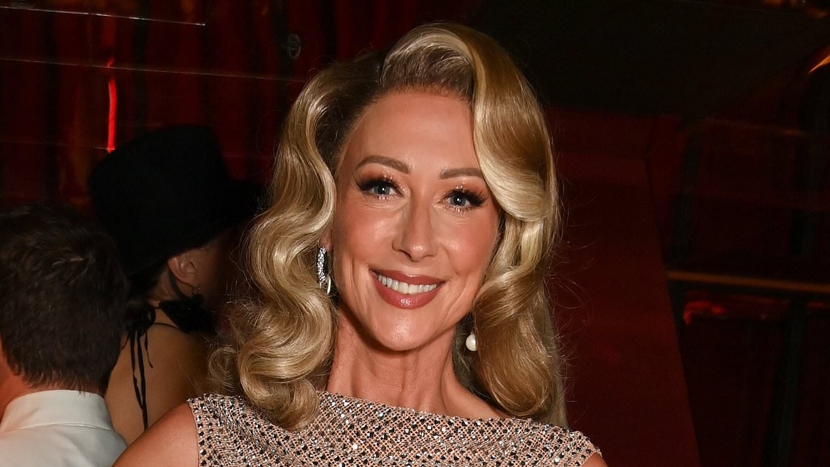 Steps star Faye Tozer shows her ex-husband what he is missing in a gold backless gown as she attends the world premiere of Dita Von Teese's Diamonds and Dust show