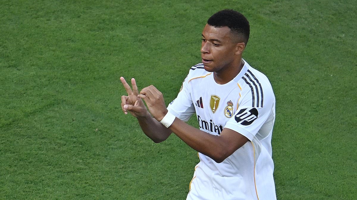 Kylian Mbappe dedicates stunning scissor-kick to Diogo Jota as Real Madrid survive late scare to beat Borussia Dortmund in thriller after THREE goals in added time- and set up crunch semi-final clash with PSG