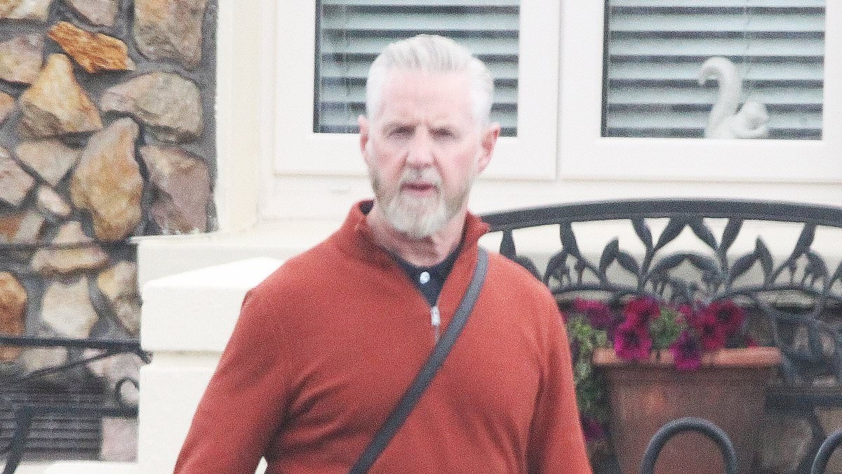EXCLUSIVE Pictured: Campaigning journalist Veronica Guerin's killer strolls in summer sunshine as he enjoys his first steps of freedom on day release from prison after 26 years