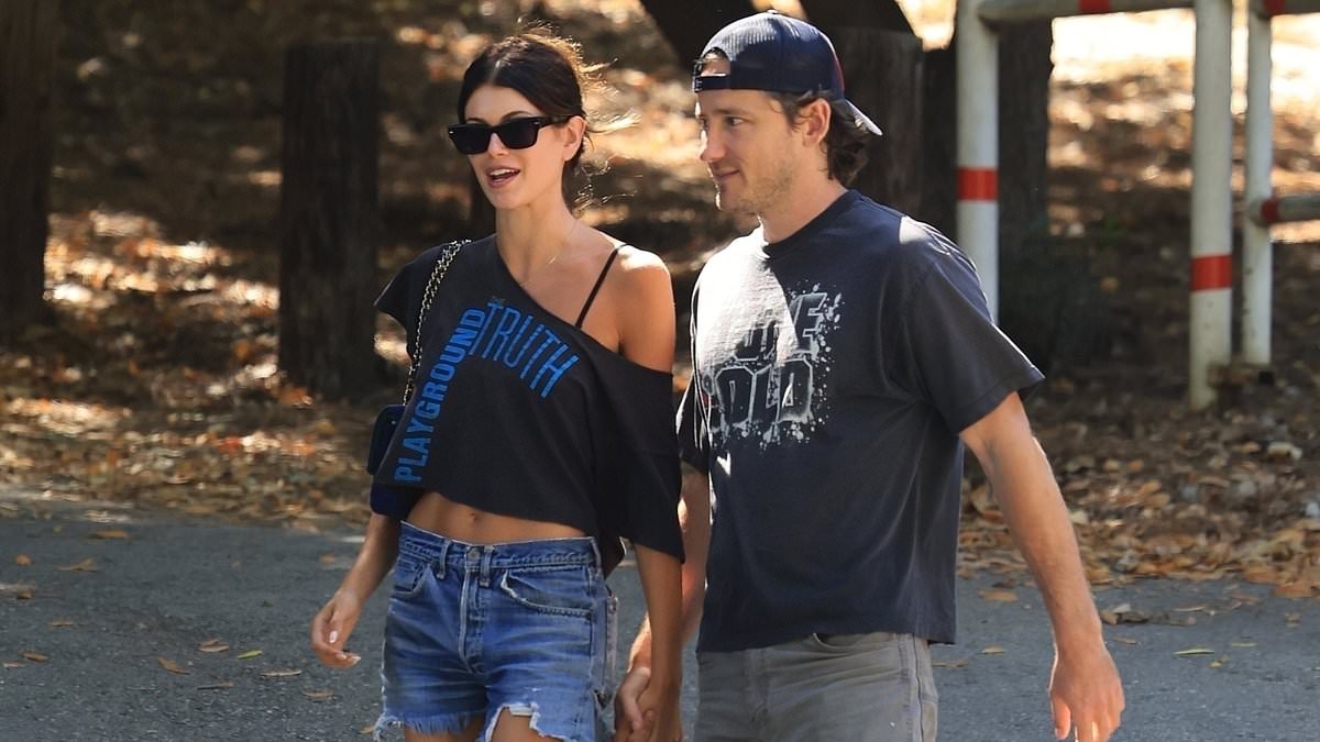 Kaia Gerber confirms romance with Lewis Pullman as they hold hands in a park