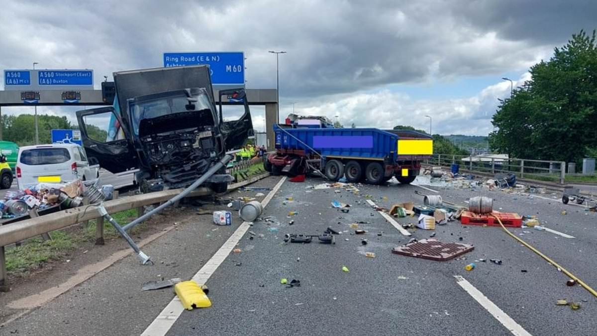 Major motorway is forced to a standstill after horror crash involving eight lorries and cars - as beer barrels spill across lanes