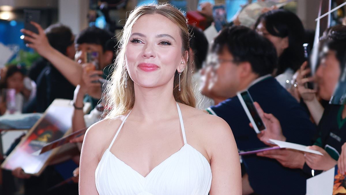 Meet Scarlett Johansson's rarely seen twin: Movie star has a handsome brother who works at a nonprofit