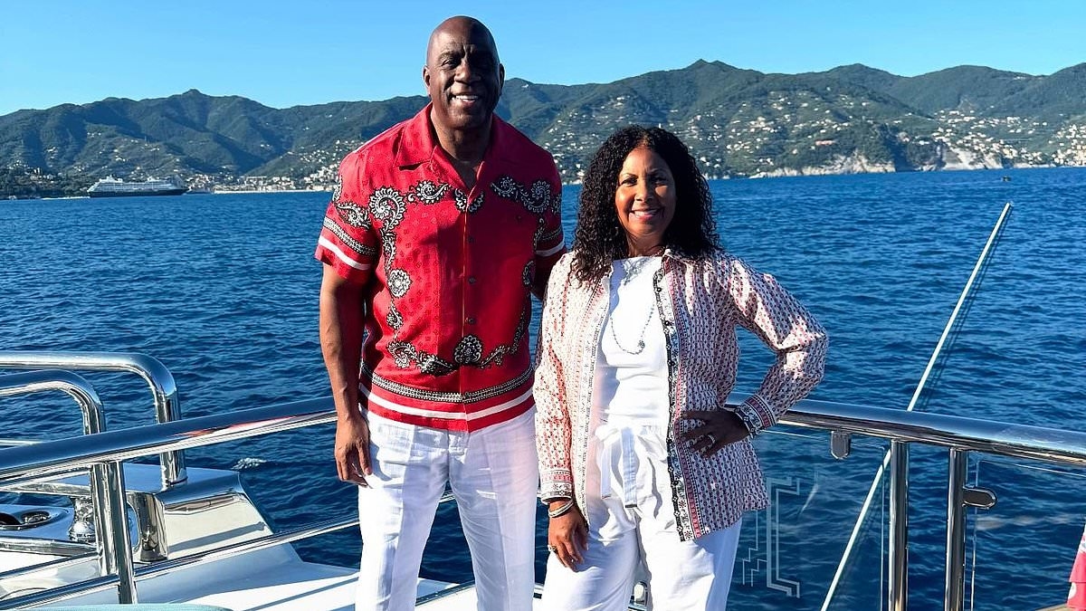 NBA legend Magic Johnson is mobbed by fans in Portofino as he heads out for glitzy lunch in bold outfit