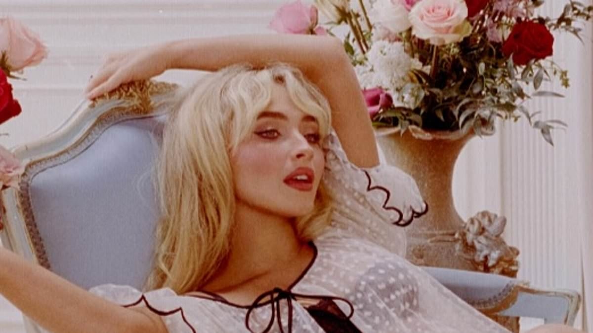 Sabrina Carpenter sizzles in black lingerie with a sheer gown as she reclines in latest Man's Best Friend cover... following backlash over THAT X-rated alternative artwork