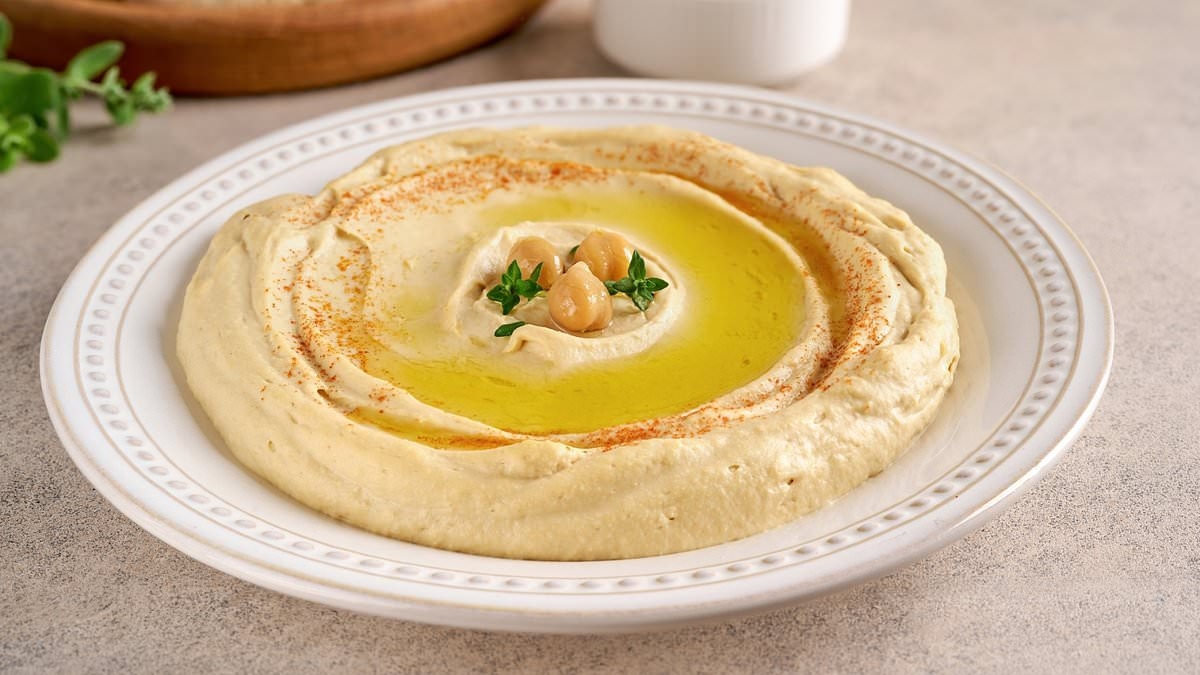 You're eating hummus wrong! Oxford scientist reveals the common error people make when enjoying the dip