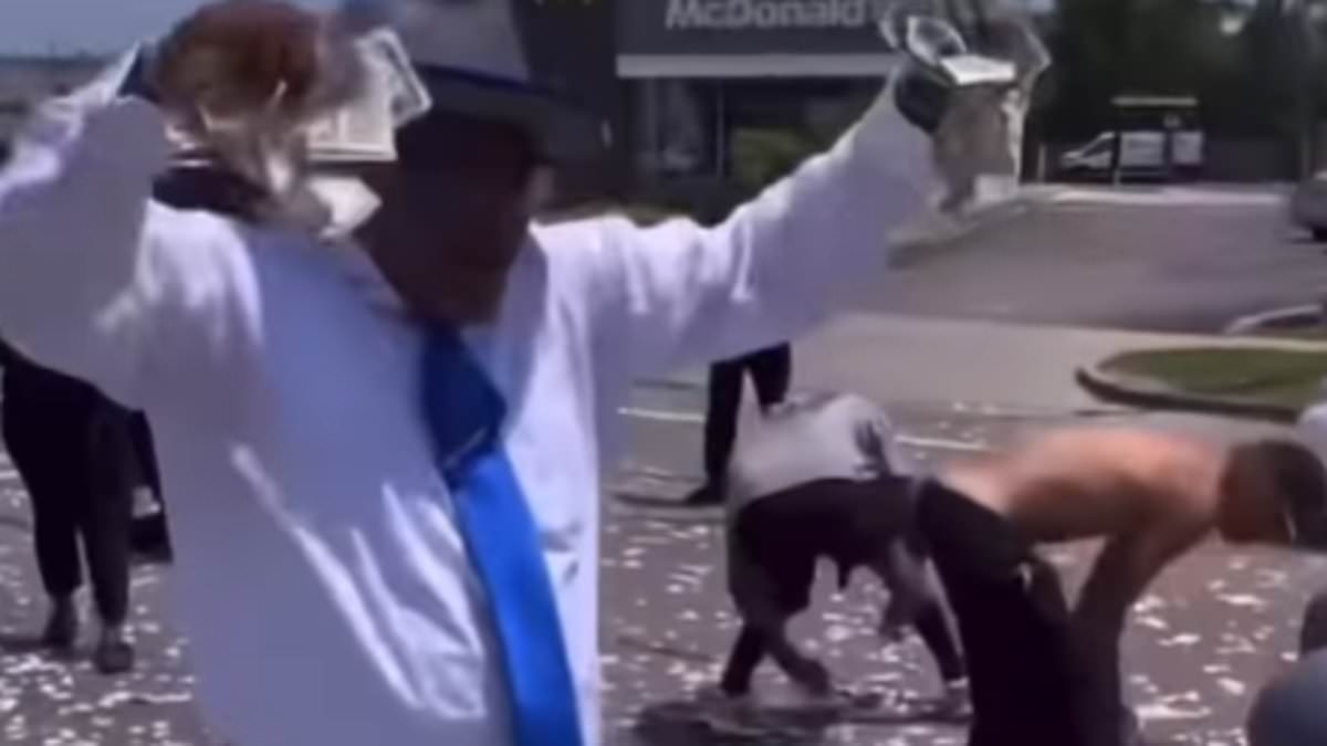 Chaos in Detroit as dead man's life savings are dropped from HELICOPTER to honor his final wish