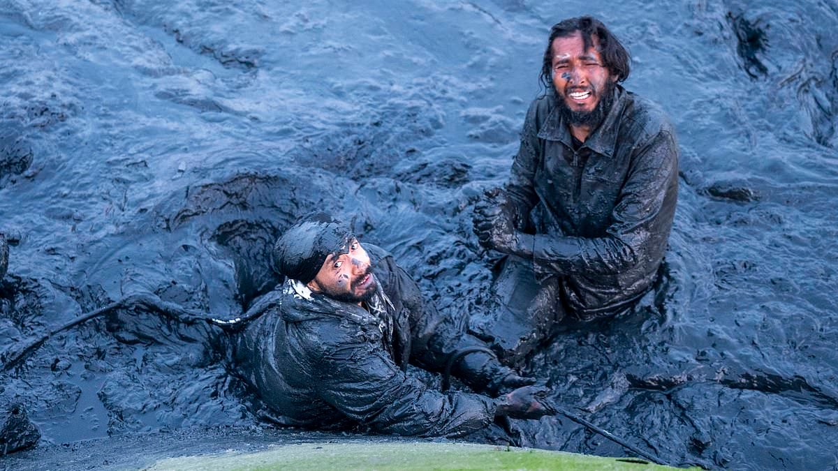 EXCLUSIVE Business as usual in Calais: Migrants make more attempts to cross Channel on day of Starmer's 'one in, one out' deal as group gets stuck in mud in failed boat launch