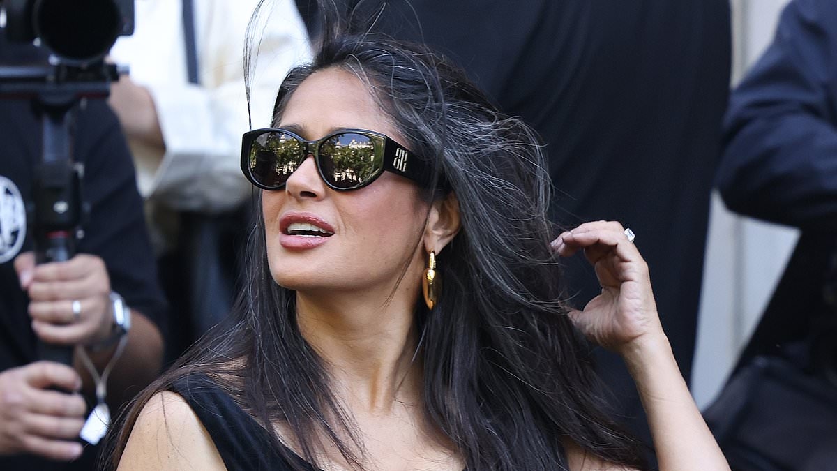 Salma Hayek, 58, embraces her natural grey hair as she attends Balenciaga show during Paris Fashion Week