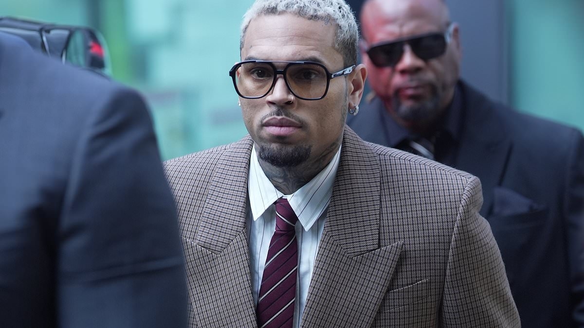 BREAKING NEWS Chris Brown arrives at court as he faces trial for 'attacking victim with a bottle' in private Mayfair club
