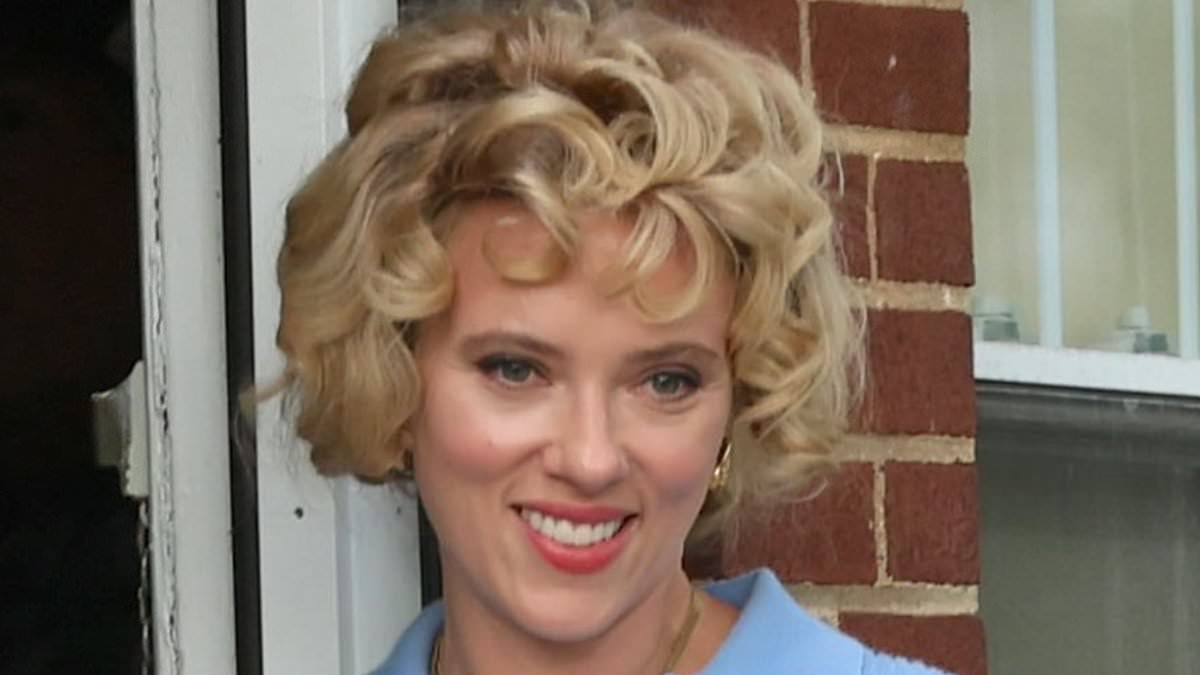 Scarlett Johansson looks worlds away from her usual style as she models short curly bob while filming her new movie in NYC