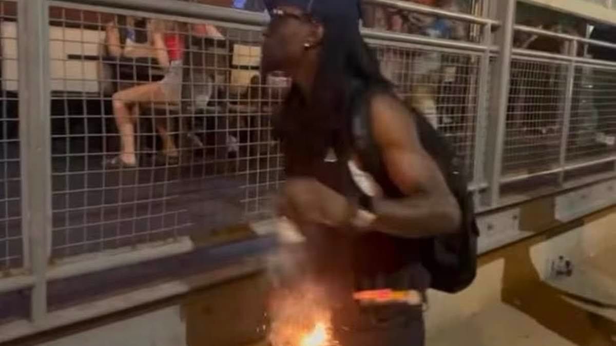 Smirking thug films himself throwing explosives into crowded bar in St Louis