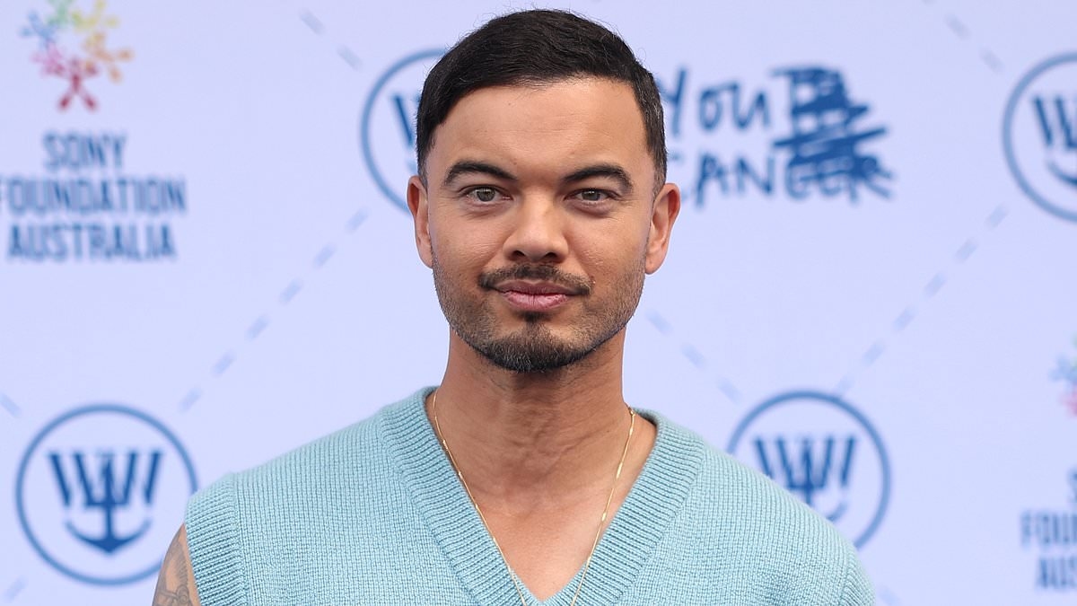 A chip off the old block! Guy Sebastian's youngest son shows off his prodigious singing talent on a family car ride