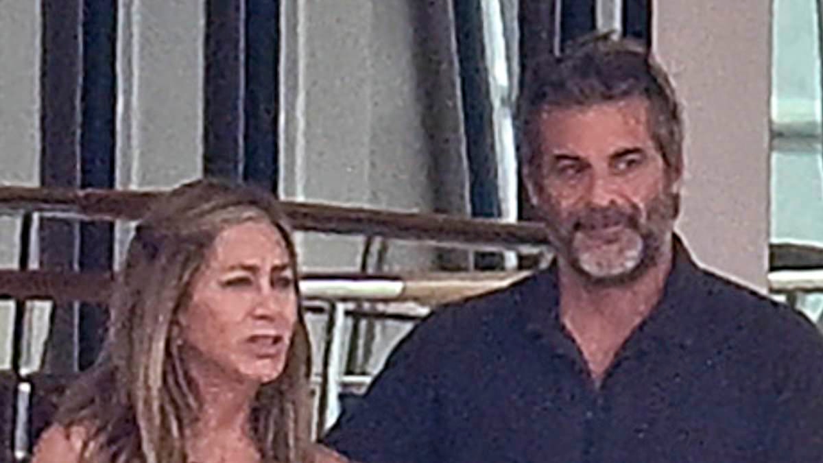 Jennifer Aniston shows off relationship with hypnotist Jim Curtis on vacay in Mallorca