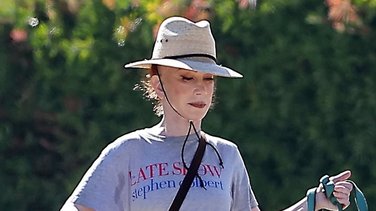 EXCLUSIVE Kathy Griffin shows off VERY taut face as she tames her wild-hair look