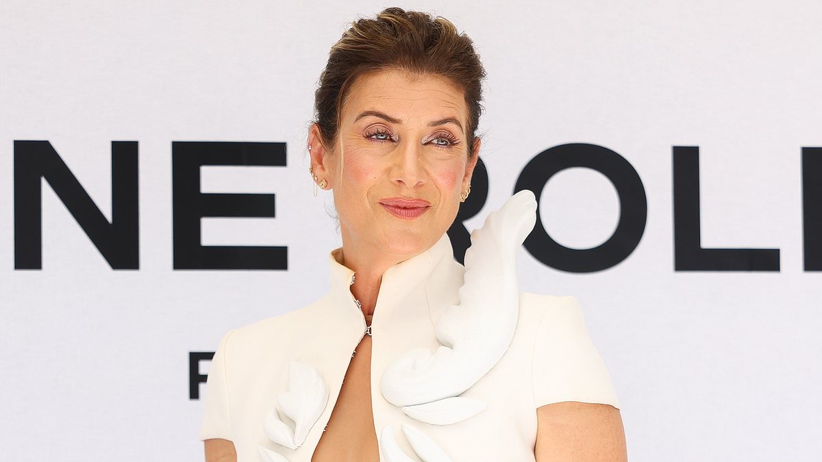 Grey's Anatomy star Kate Walsh, 57, goes commando at Paris Fashion Week alongside her Aussie fiancé