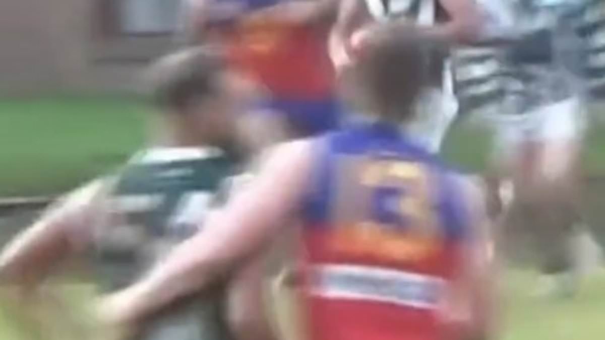Watch the shock moment footballer coward punches player before appearing to fall over