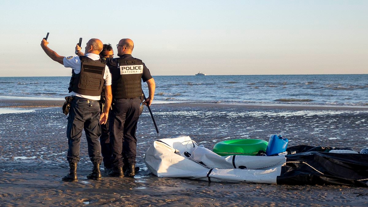 Calais police pose for a selfie after they slash people smugglers' dinghy... before letting the gang saunter away