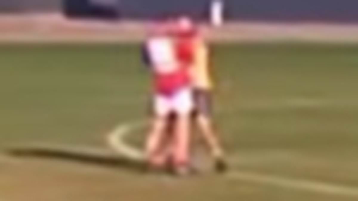 See the disgraceful moment a grown man allegedly punches a teenager in the throat - leaving the youngster struggling to breathe