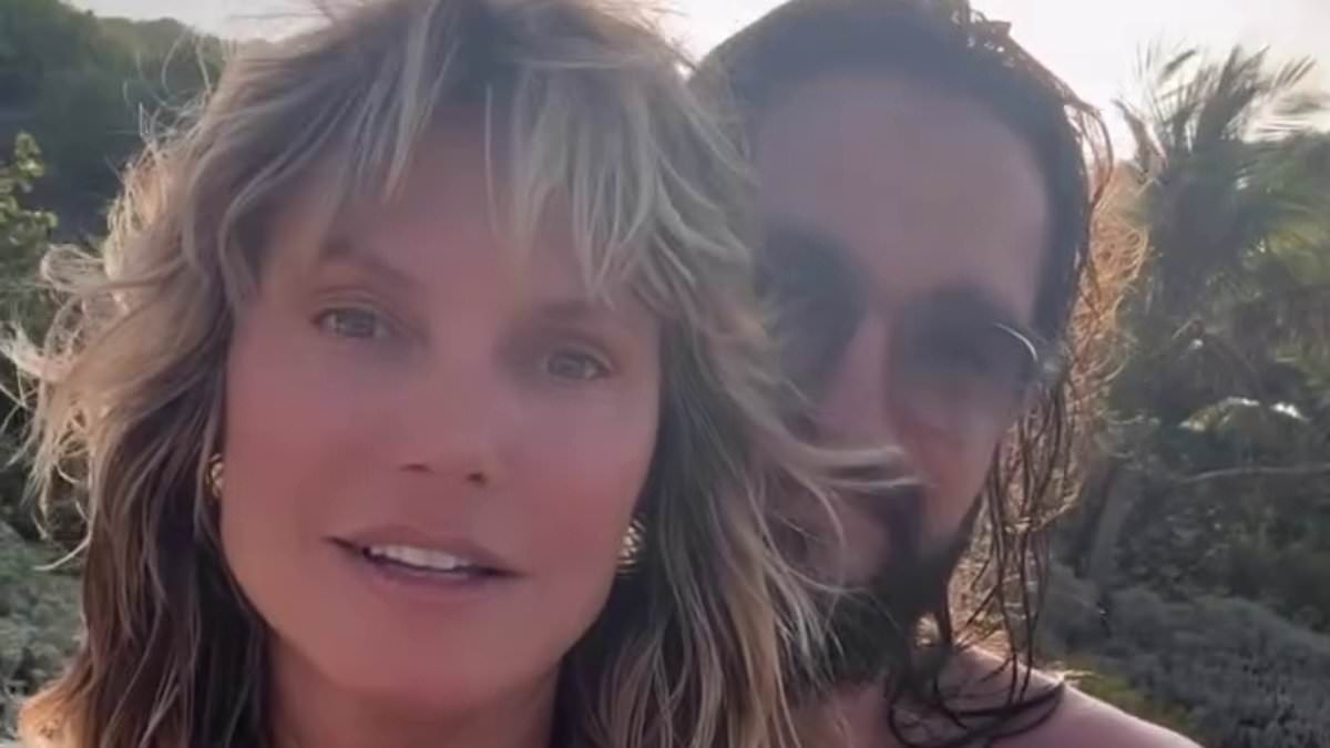 Heidi Klum, 52, stuns in a plunging halterneck bikini as she shares steamy video with husband Tom Kaulitz, 35, during beach holiday