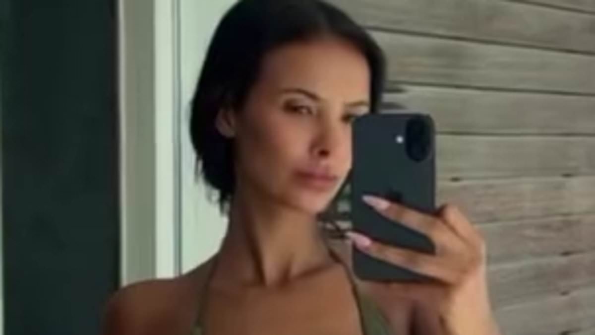 Maya Jama sizzles in a plunging green bikini as she receives a huge bouquet of red roses from boyfriend Ruben Dias during Ibiza getaway