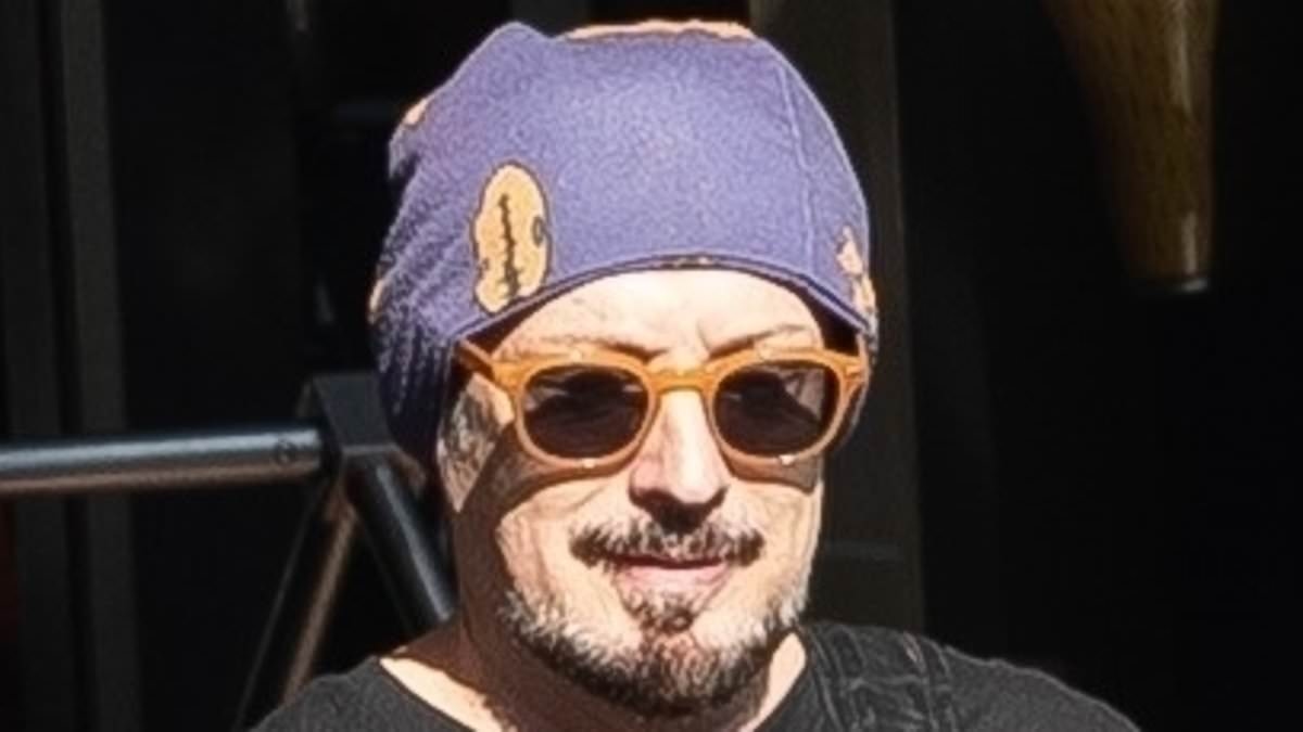 '80s pop icon looks unrecognisable as he's pictured leaving a Hollywood hotel