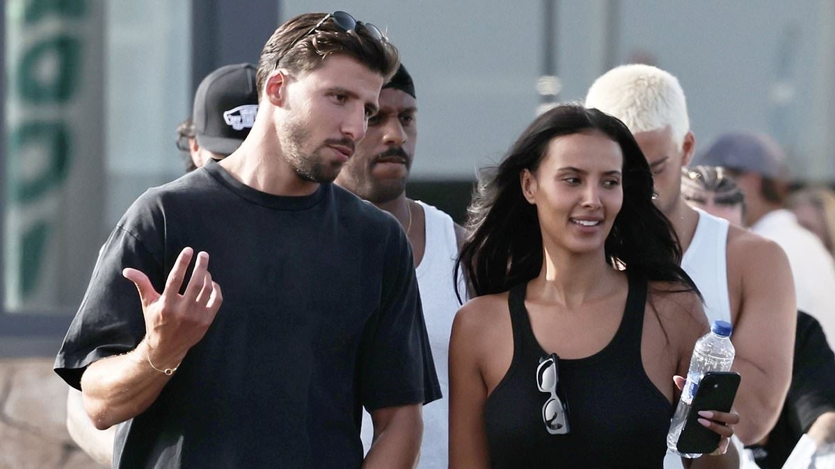Maya Jama puts on a loved-up display with boyfriend Ruben Dias as they arrive hand-in-hand at Ibiza Airport for a romantic getaway
