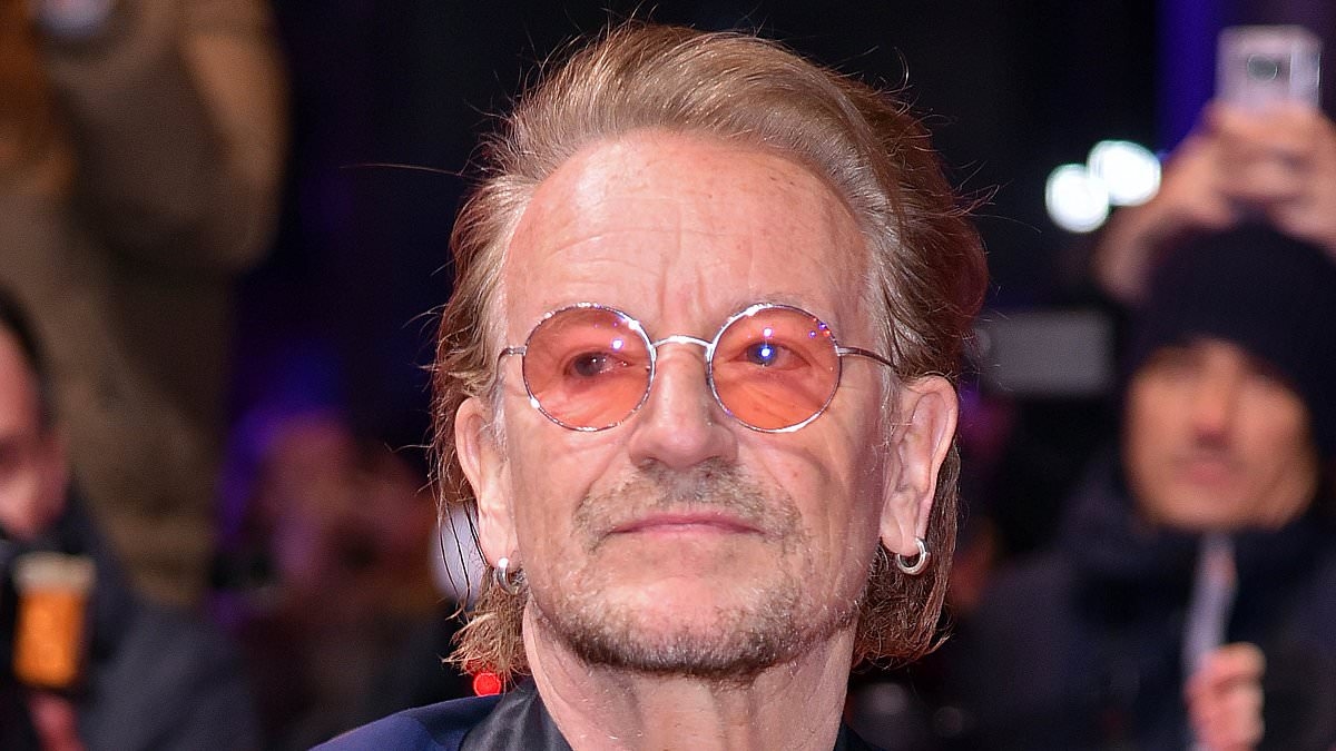 U2 frontman Bono reveals he lived on leftover airline food and Cadbury's Smash after losing his mother at 14 - and spent his money on records instead