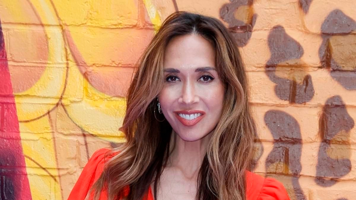 Myleene Klass stuns in vibrant red midi dress as she joins glamorous Vanessa Bauer and Vanessa Feltz at Versace event in London