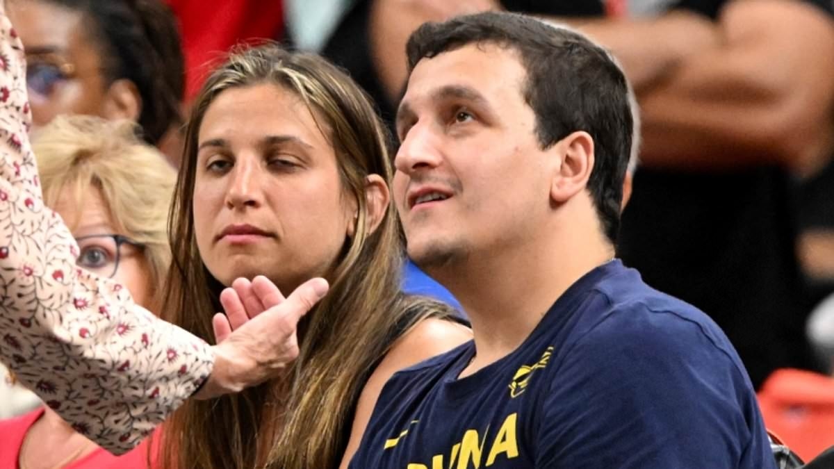 BREAKING NEWS Caitlin Clark fan thrown out of game after rival WNBA star was left furious over explosive courtside exchange