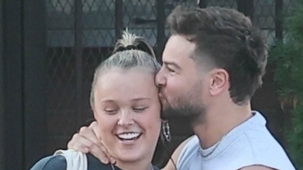 EXCLUSIVE Chris Hughes packs on the PDA with girlfriend JoJo Siwa as he gushes he's 'totally in love' with her while they head to a couples' massage in LA