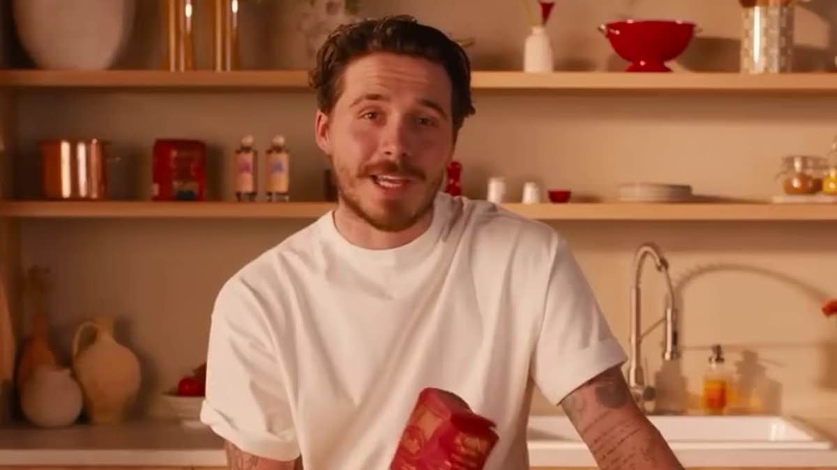 Aspiring chef Brooklyn Beckham whips up a pasta dish in the kitchen amid plans to take over food industry - after liquor line setback and his ongoing family feud