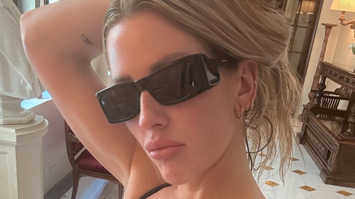 Ellie Goulding shows off her sensational figure in a triangle bikini during Italian holiday after heading to Tracey Emin exhibition in Florence