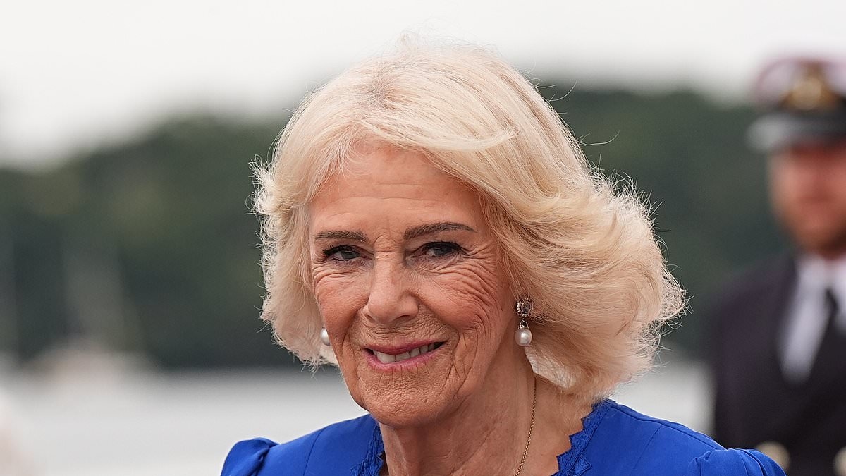 Queen Camilla shakes hand of adorable little boy on board HMS Astute after becoming first UK woman to hold top Naval role