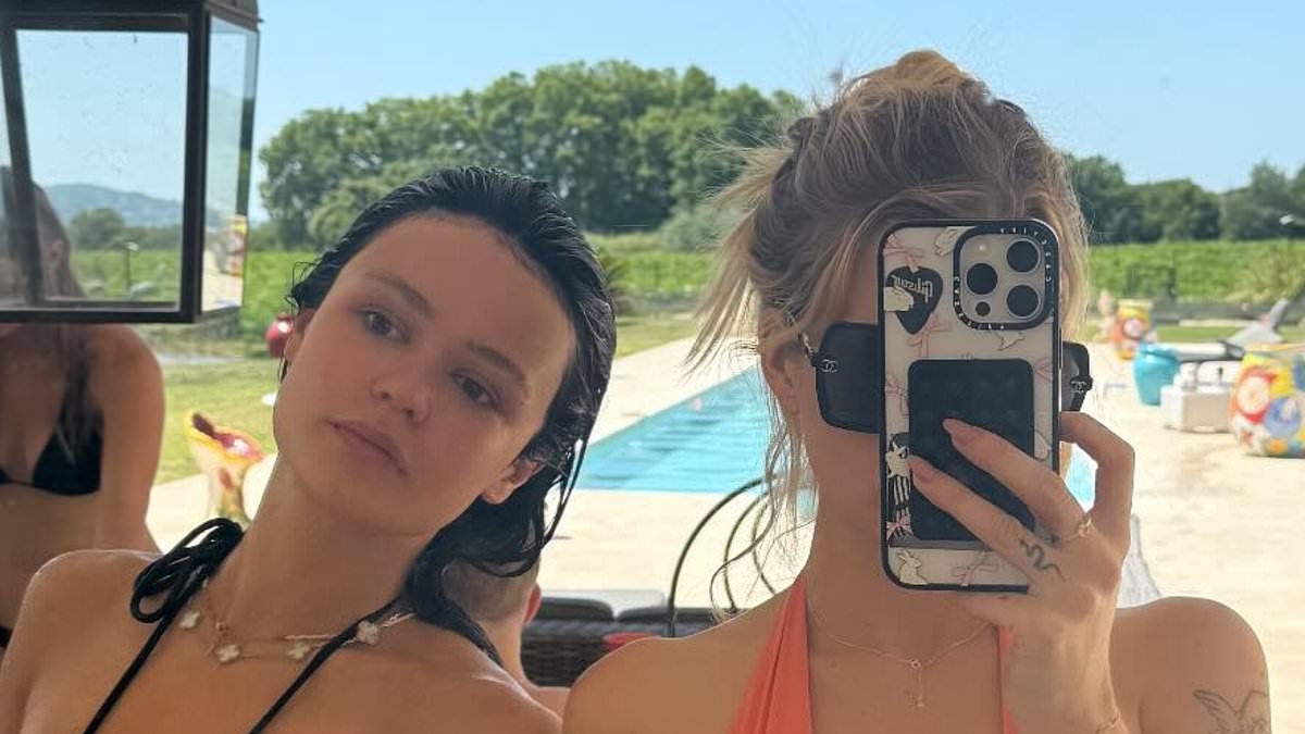 Lottie Moss puts on a daring display in skimpy orange halterneck bikini with low-rise briefs as she parties with pals on sun-soaked girls trip