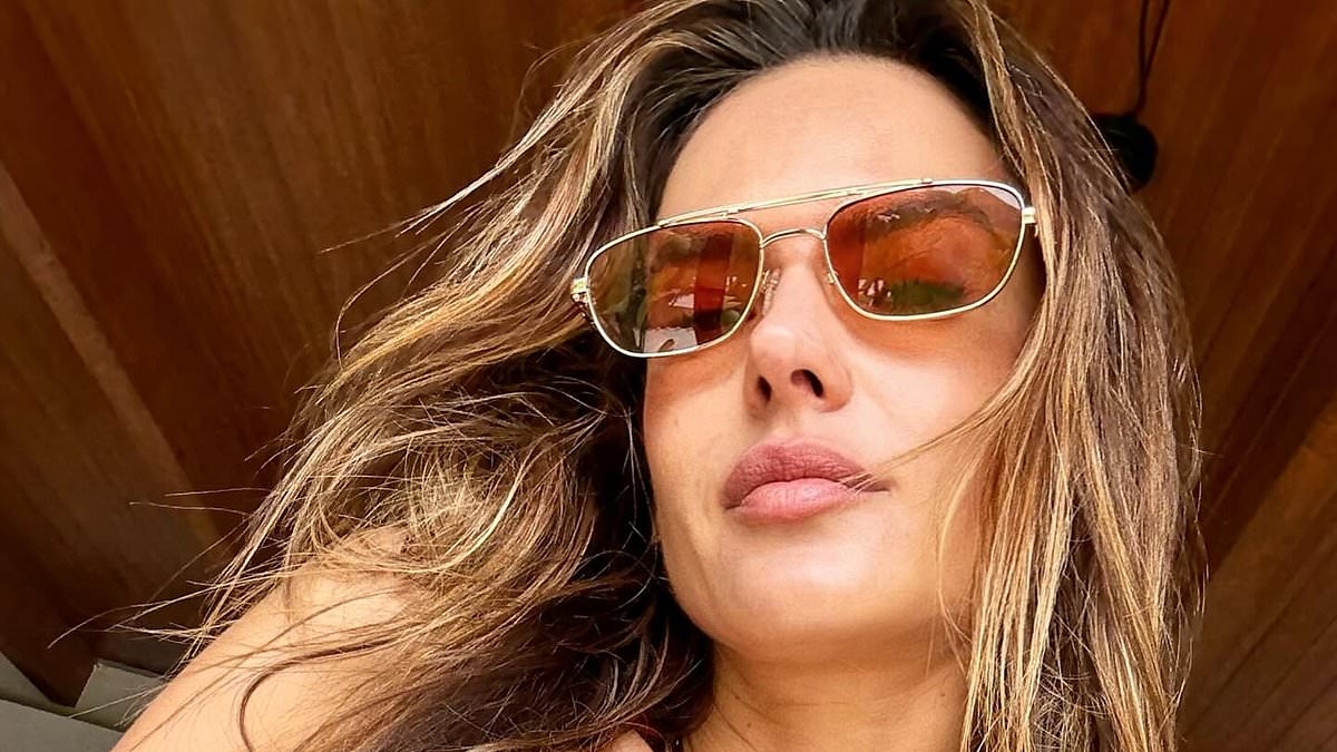 Alessandra Ambrosio, 44, goes TOPLESS as she sunbathes on Ibiza holiday